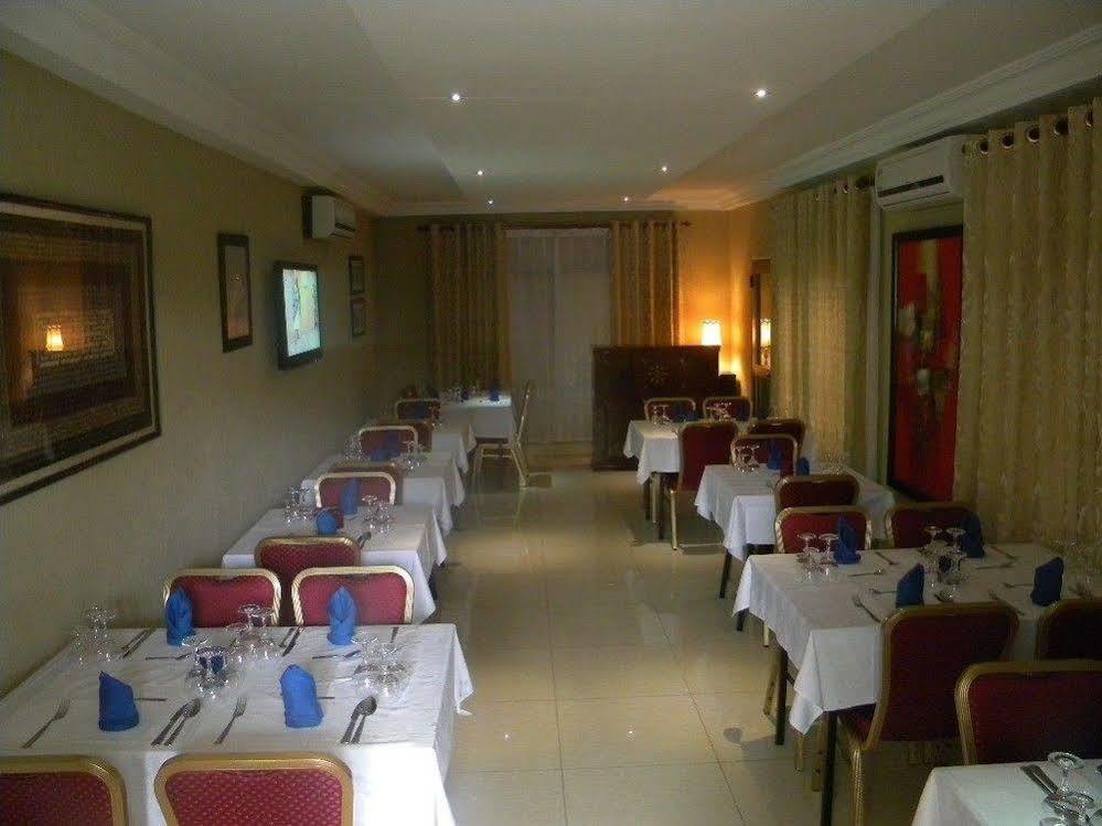 Hotel Residence Flamani Ломе Экстерьер фото